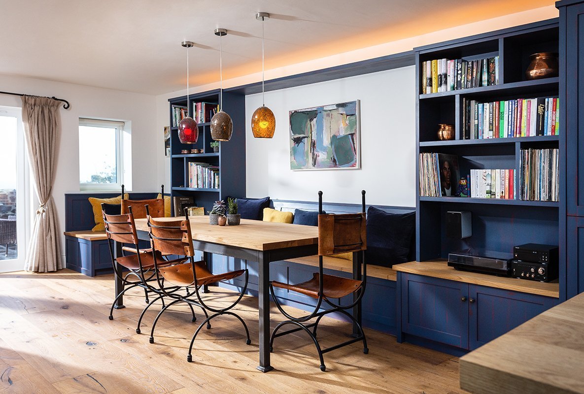 Built-in-bench-dining-table-shelving-and-stoarge-Samule-F-Walsh-Furniture-Kitchens-Interiors-Cornwall